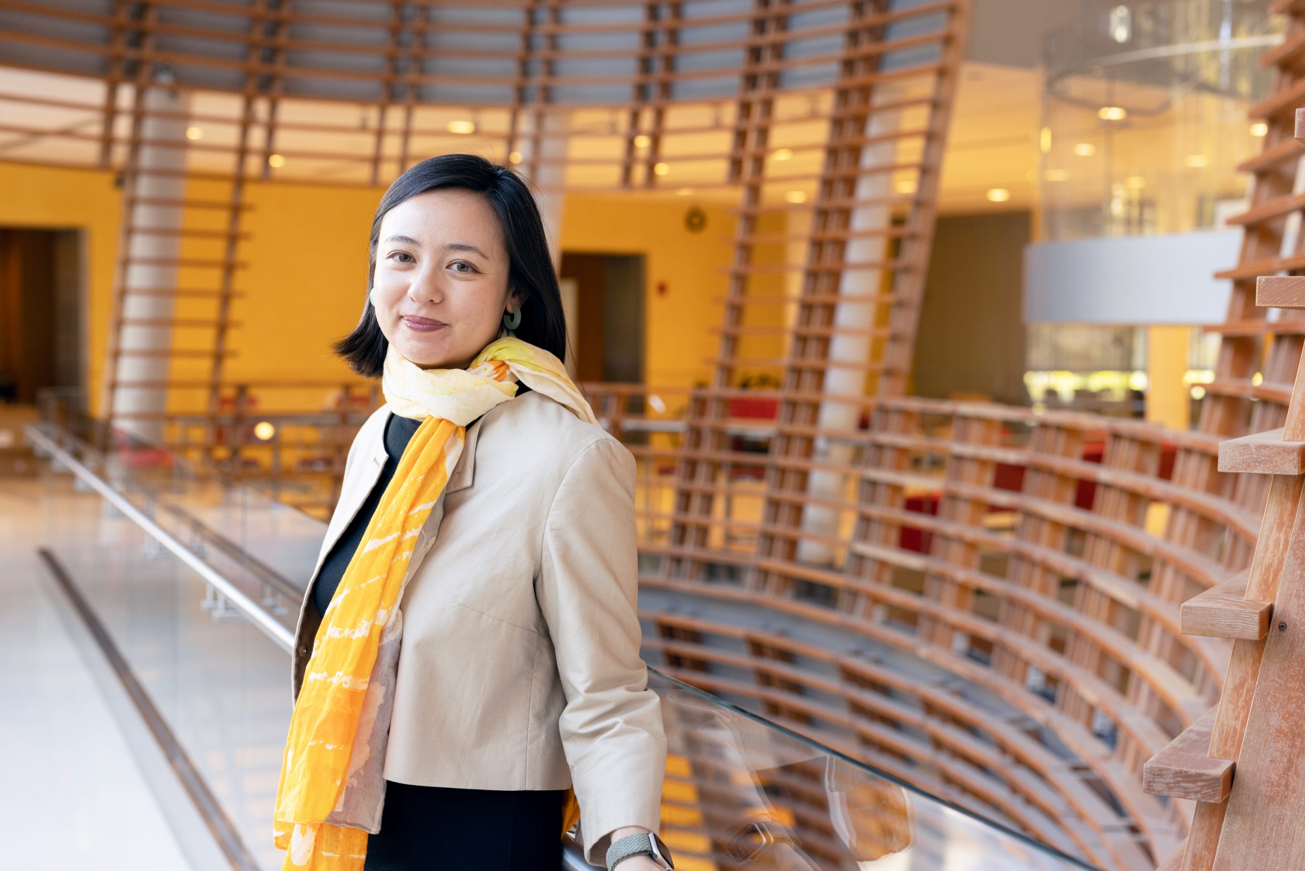 Portrait of Leslie in the atrium at the Rockefeller University Collaborative Research Center