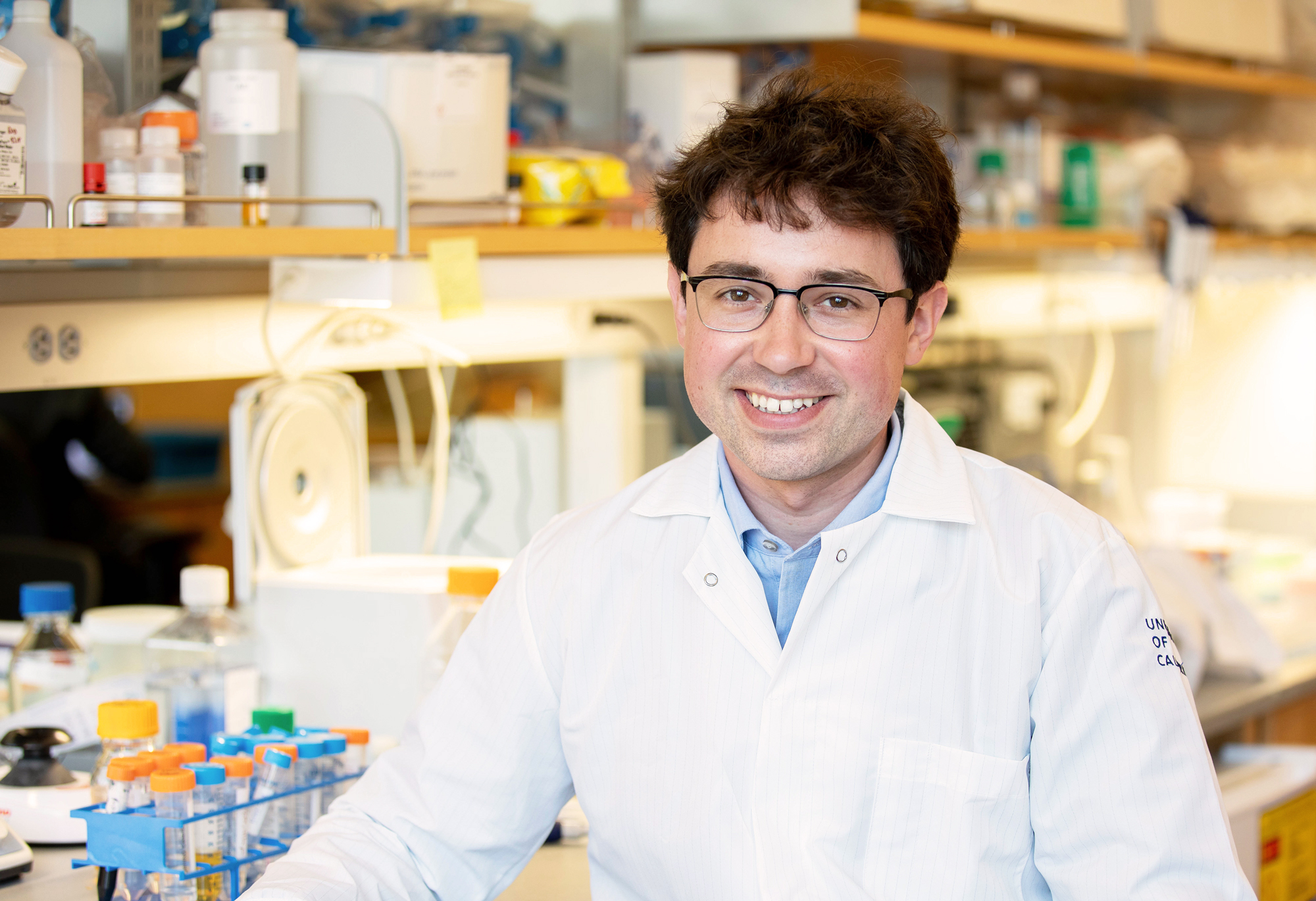 Photo of Tomasz Nowakowski at UCSF Neurosurgery building in the research lab.