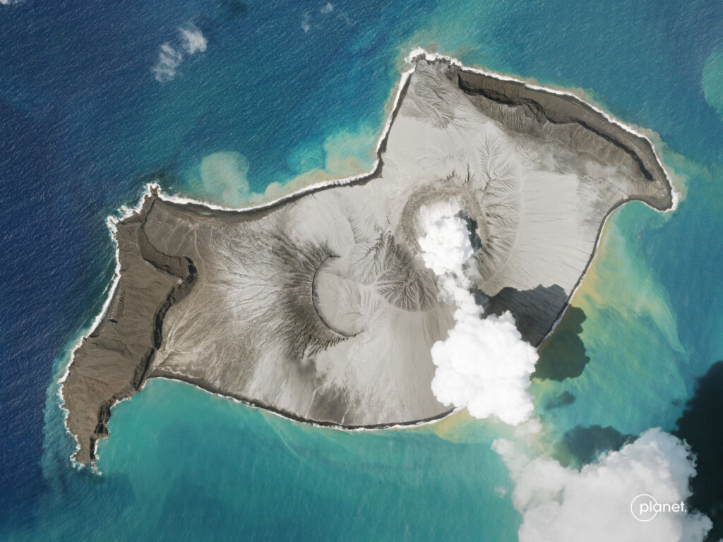 A plume of smoke rises from the volcano Hunga Tonga–Hunga Haʻapai in Tonga.