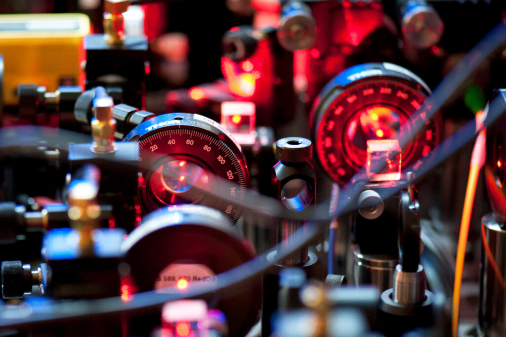Photo of the complex setup of laser beams that manipulates the ultra cold atoms.