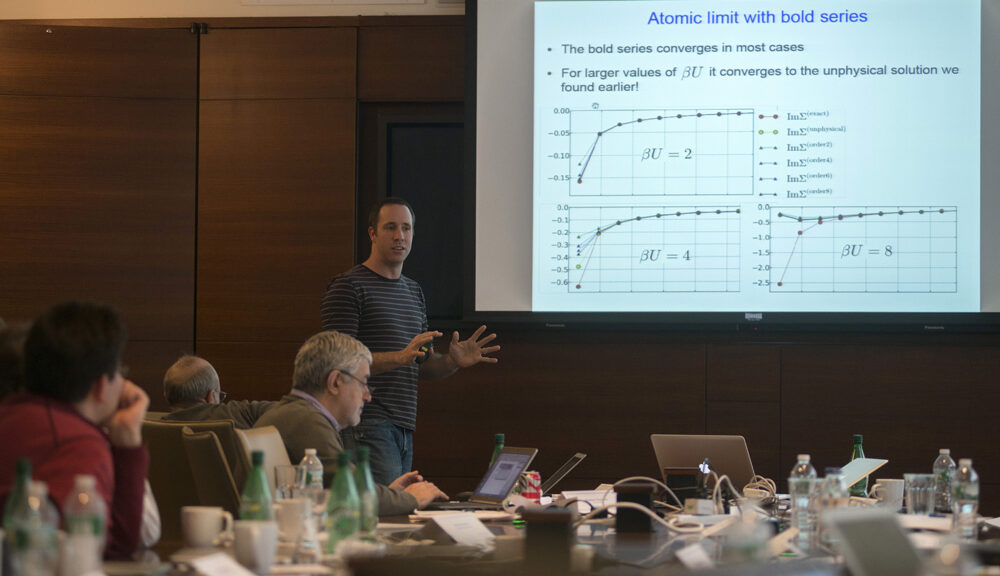 Michel Ferrero presenting a slideshow titled Atomic limit with bold series
