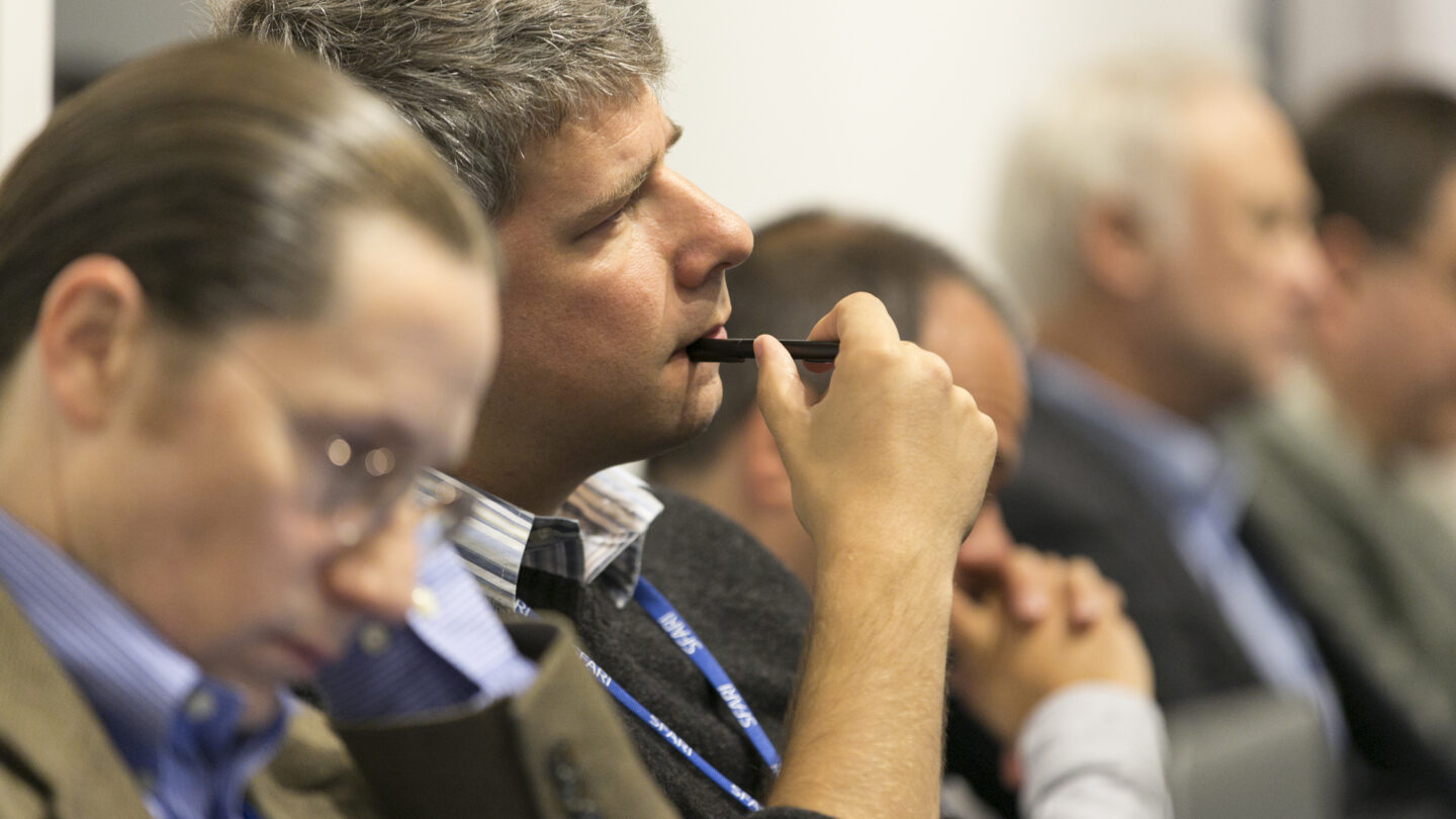 People sitting in a lecture hall row