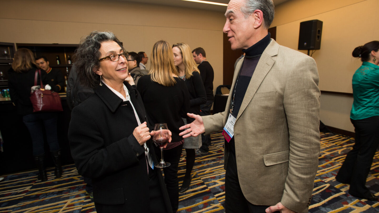 Woman and man standing while talking