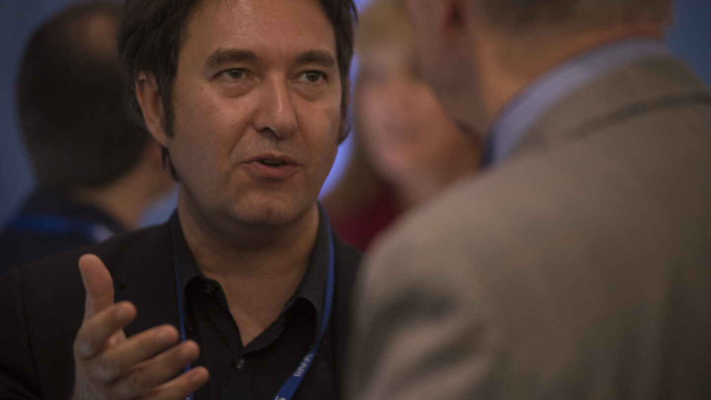 Man talking to another person