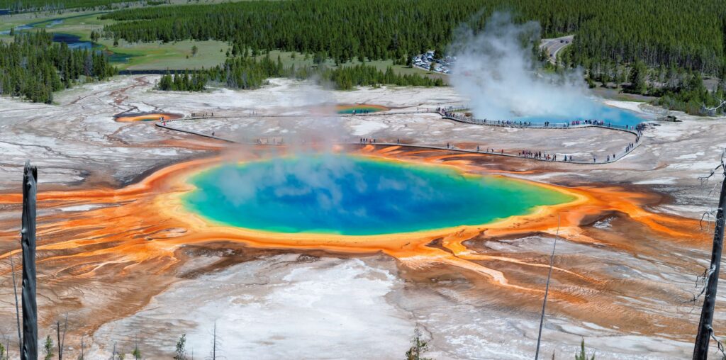 A bird's-eye-view photograph of the Grand Prismatic Spring in Yellowstone national park within Wyoming.