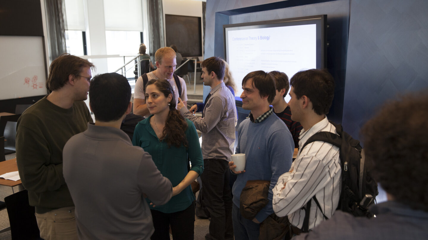 Group of people standing and talking