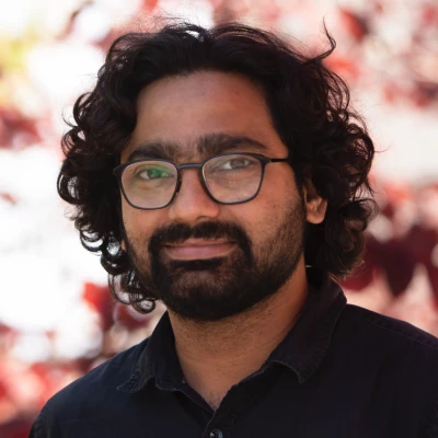 Man with glasses and a beard.