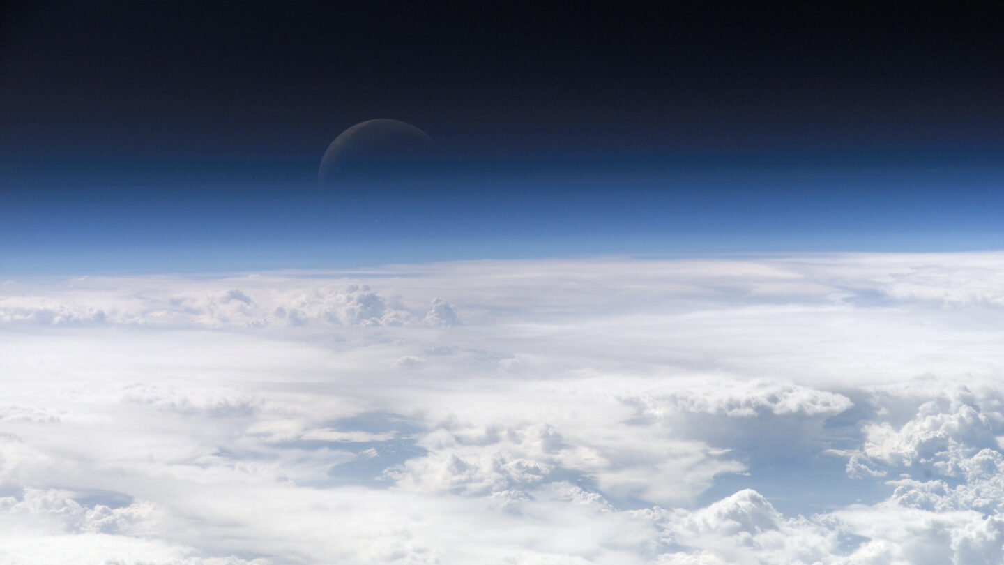Astronaut photograph ISS013-E-54329 showing how atmospheric gases scatter blue wavelengths of visible light more than other wavelengths, giving the Earth’s visible edge a blue halo