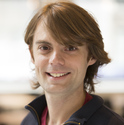 Portrait photo of scientist Tim Austin