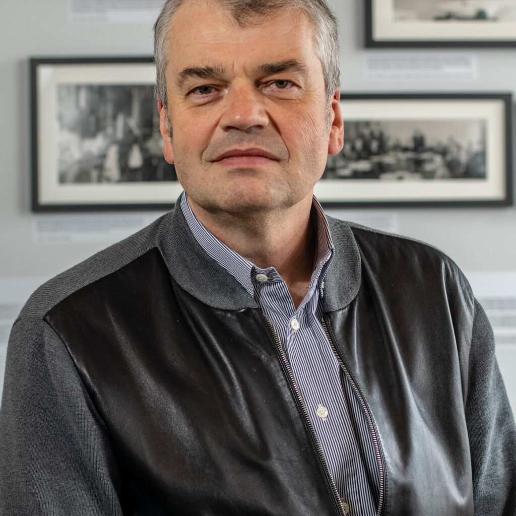 A portrait photo of Dmitri Basov.