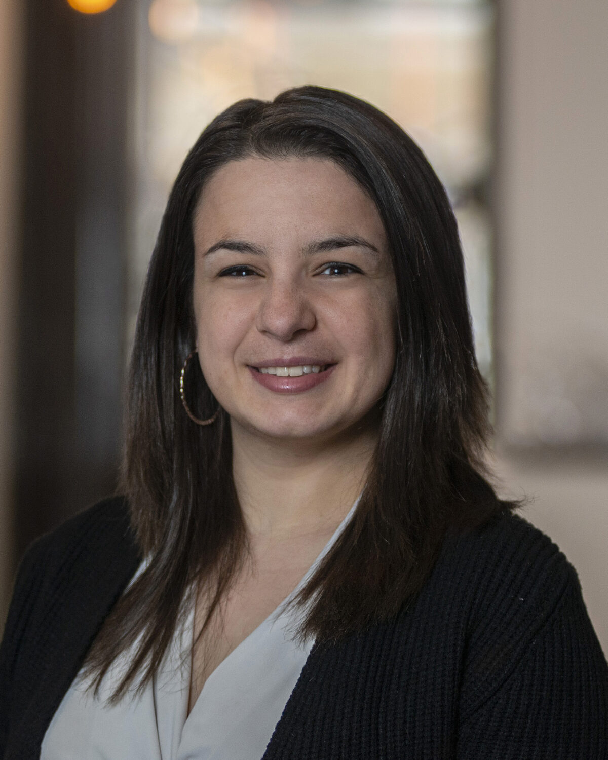 A portrait photo of Kristen Camputaro.
