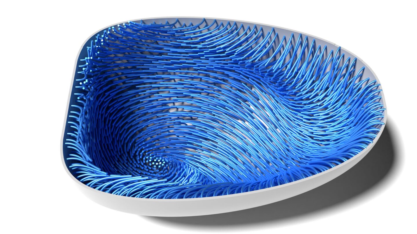 A white, three-sided bowl with intricate, swirling blue strands filling the inside, creating a dynamic, wave-like texture. The bowl casts a soft shadow on a white background.