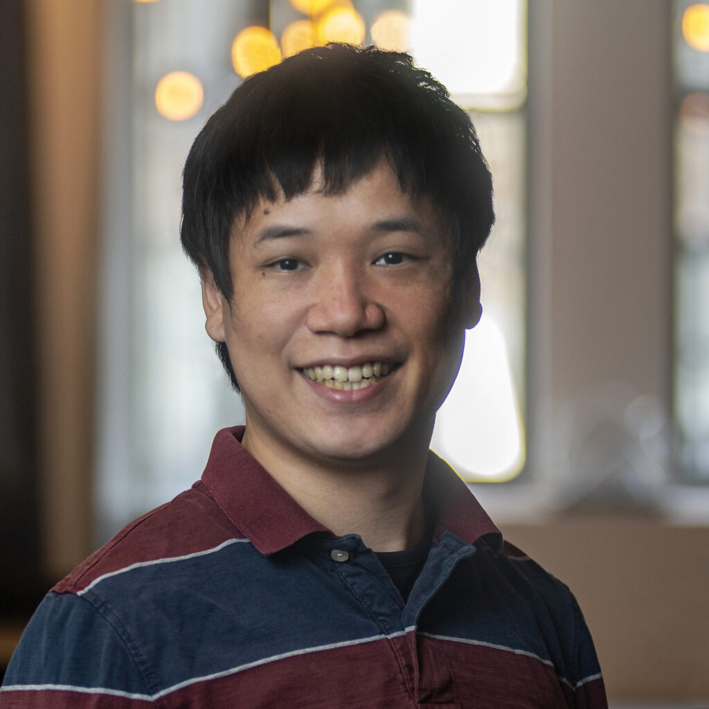A portrait photo of Kun Chen.