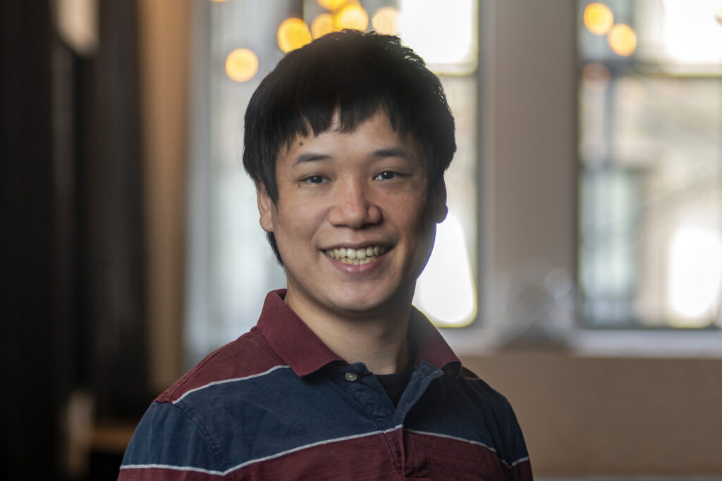 A portrait photo of Kun Chen.
