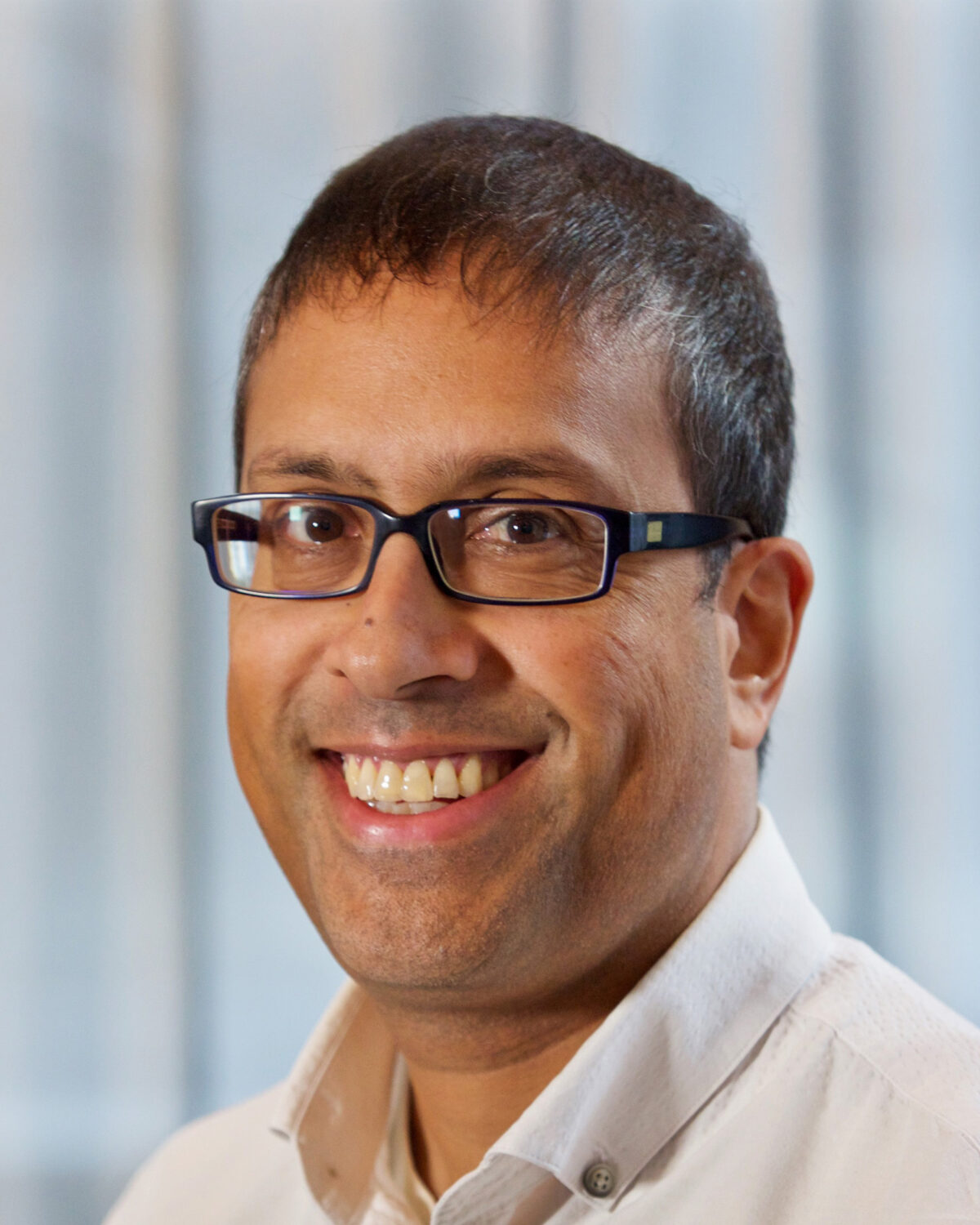 A portrait photo of Aashish Clerk.