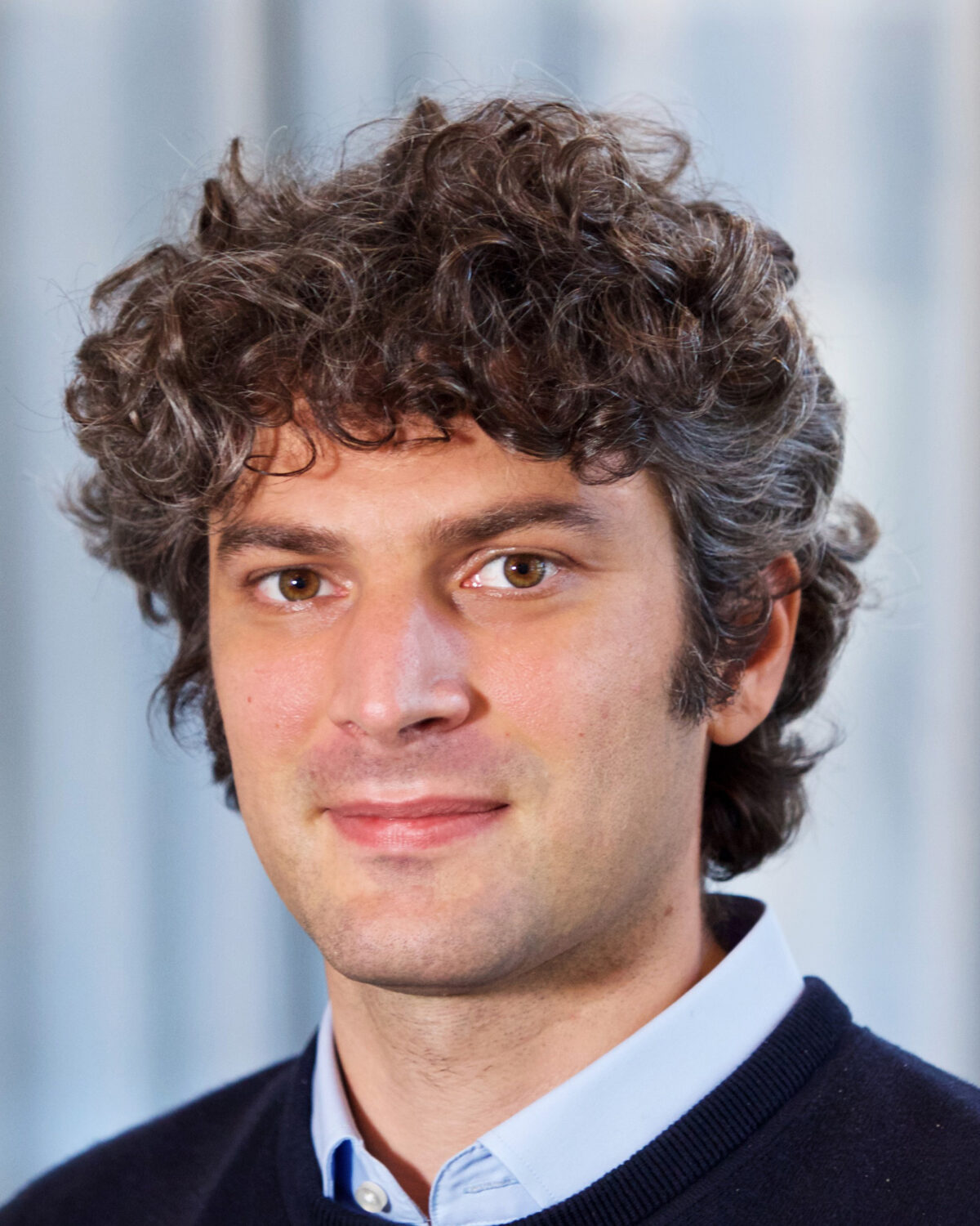 A portrait photo of Guido De Philippis.