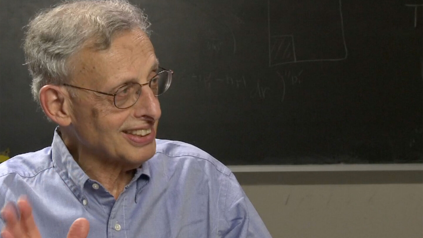 Elias Stein talking in front of a chalkboard