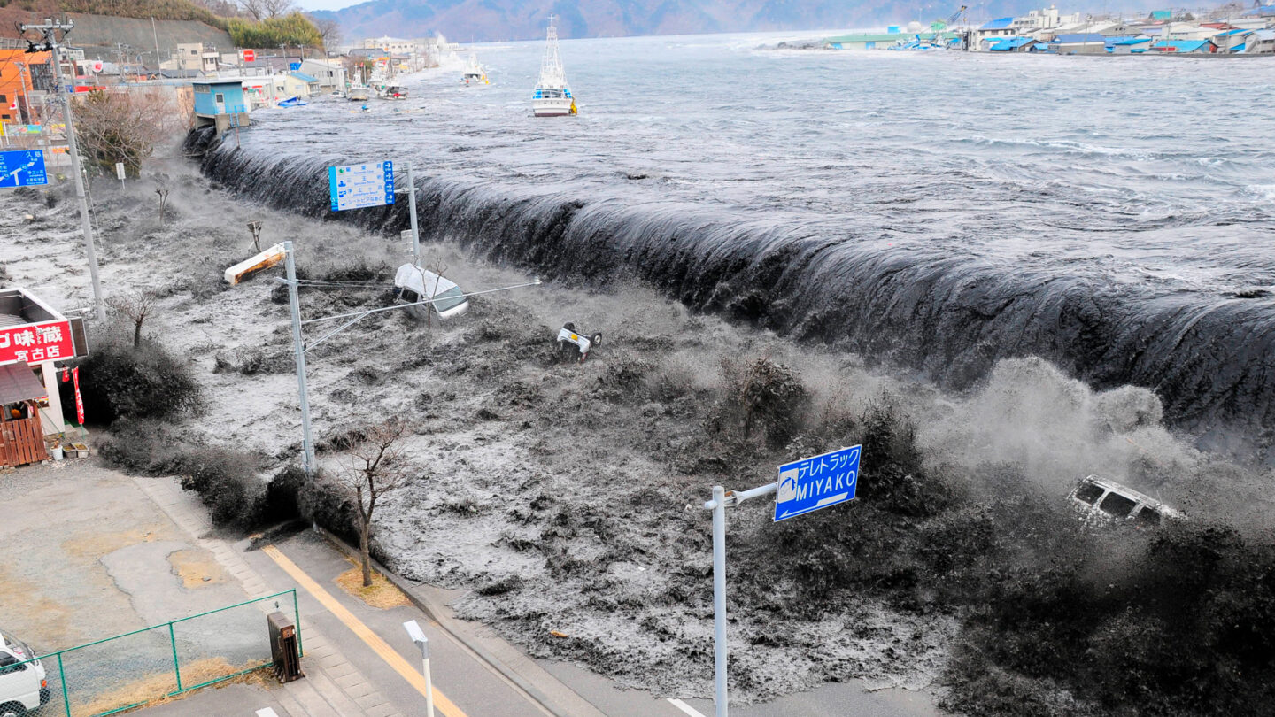 A photo of a large wave approaching Miyako City, Japan, after a magnitude 8.9 earthquake struck the area in Miyako, Japan, March 11, 2011.