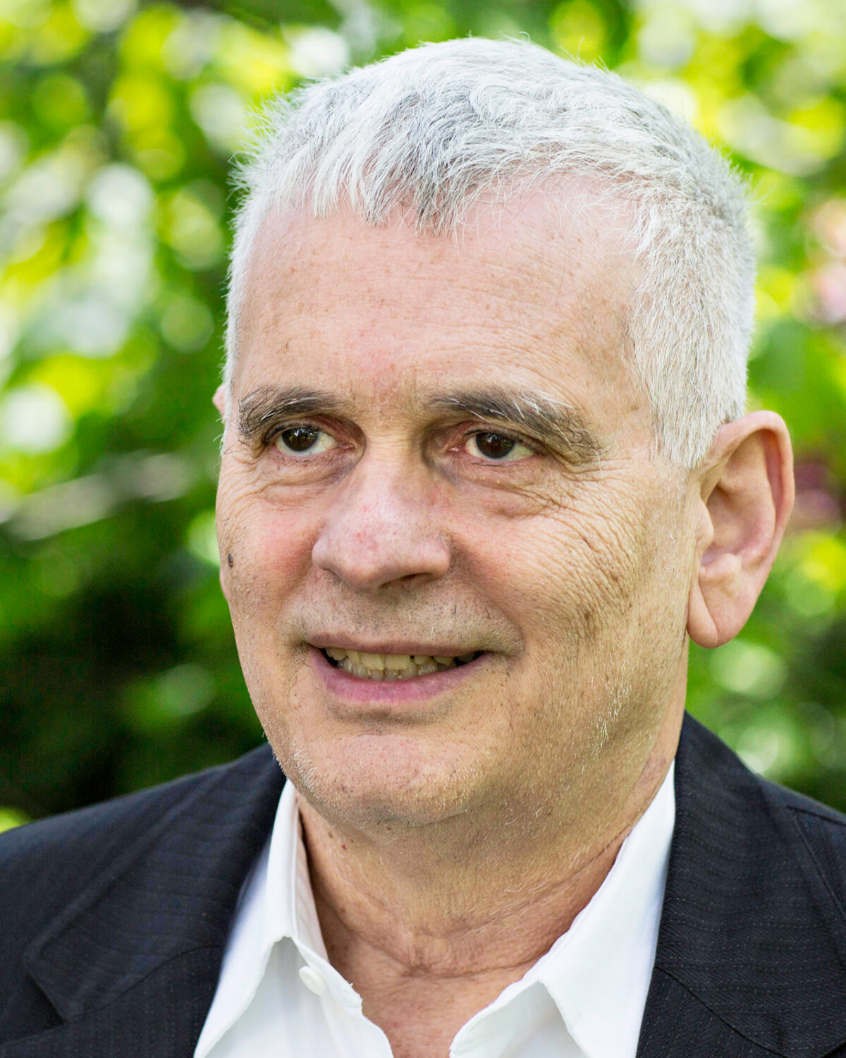 A portrait photo of Dorian Goldfeld.