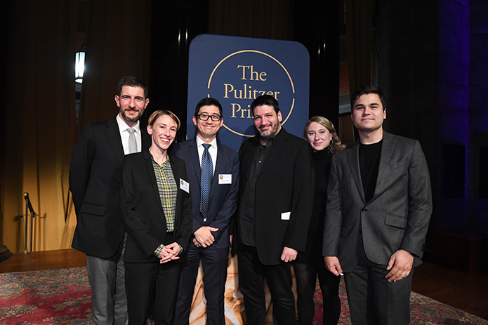 Quanta staff in front of The Pulitzer Prize sign