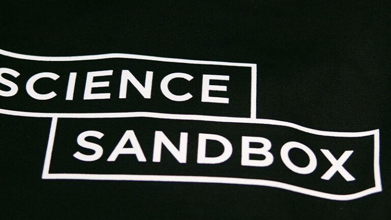 black and white Science Sandbox banner