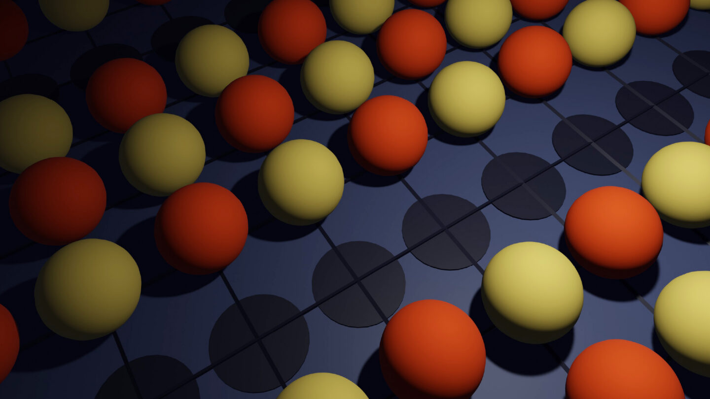 An illustration of colored balls on a chessboard-like grid.