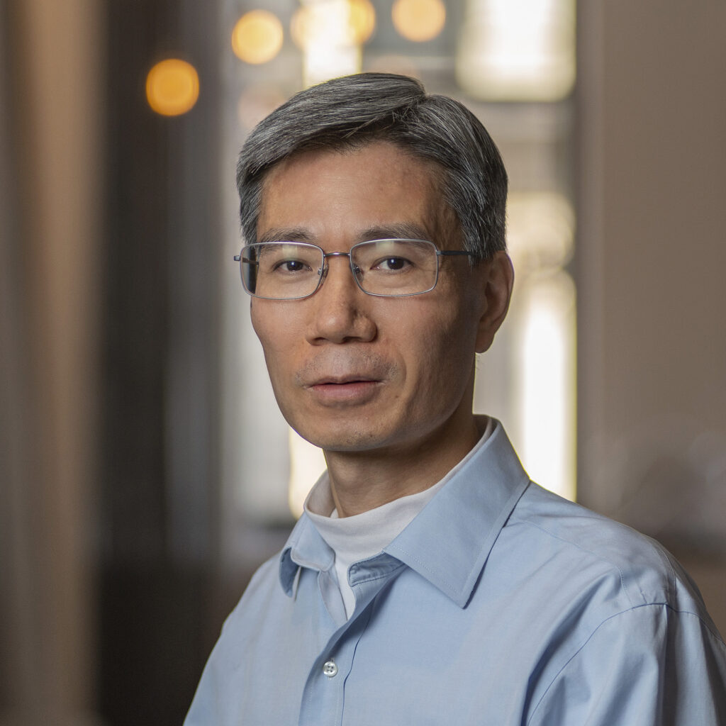 A portrait photo of Shidong Jiang.