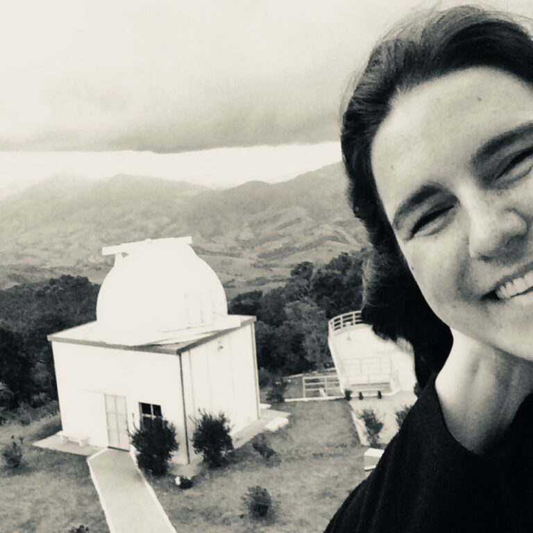 A portrait photo of Karín Menéndez-Delmestre.