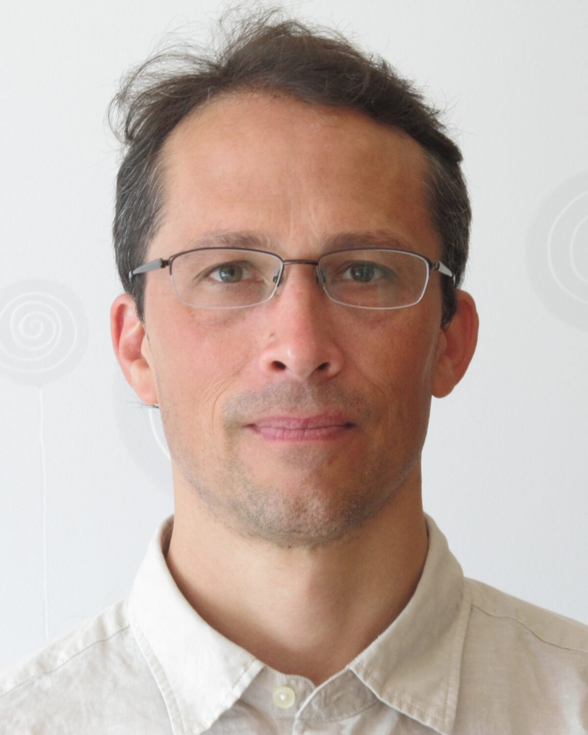 Portrait photo of Adam Kohn