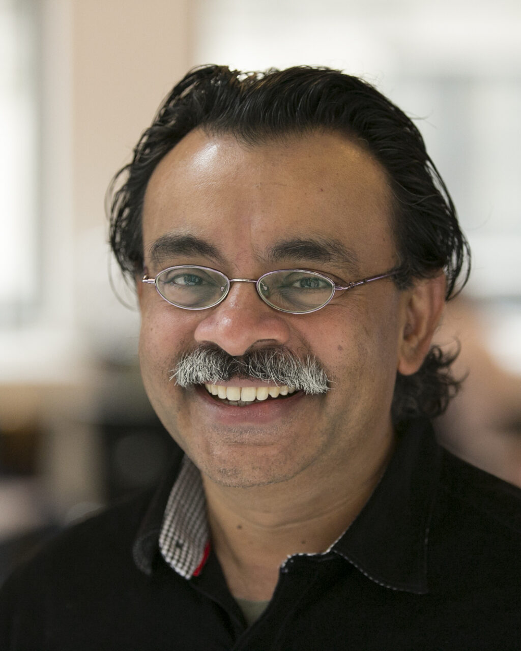 Portrait photo of Madhu Sudan