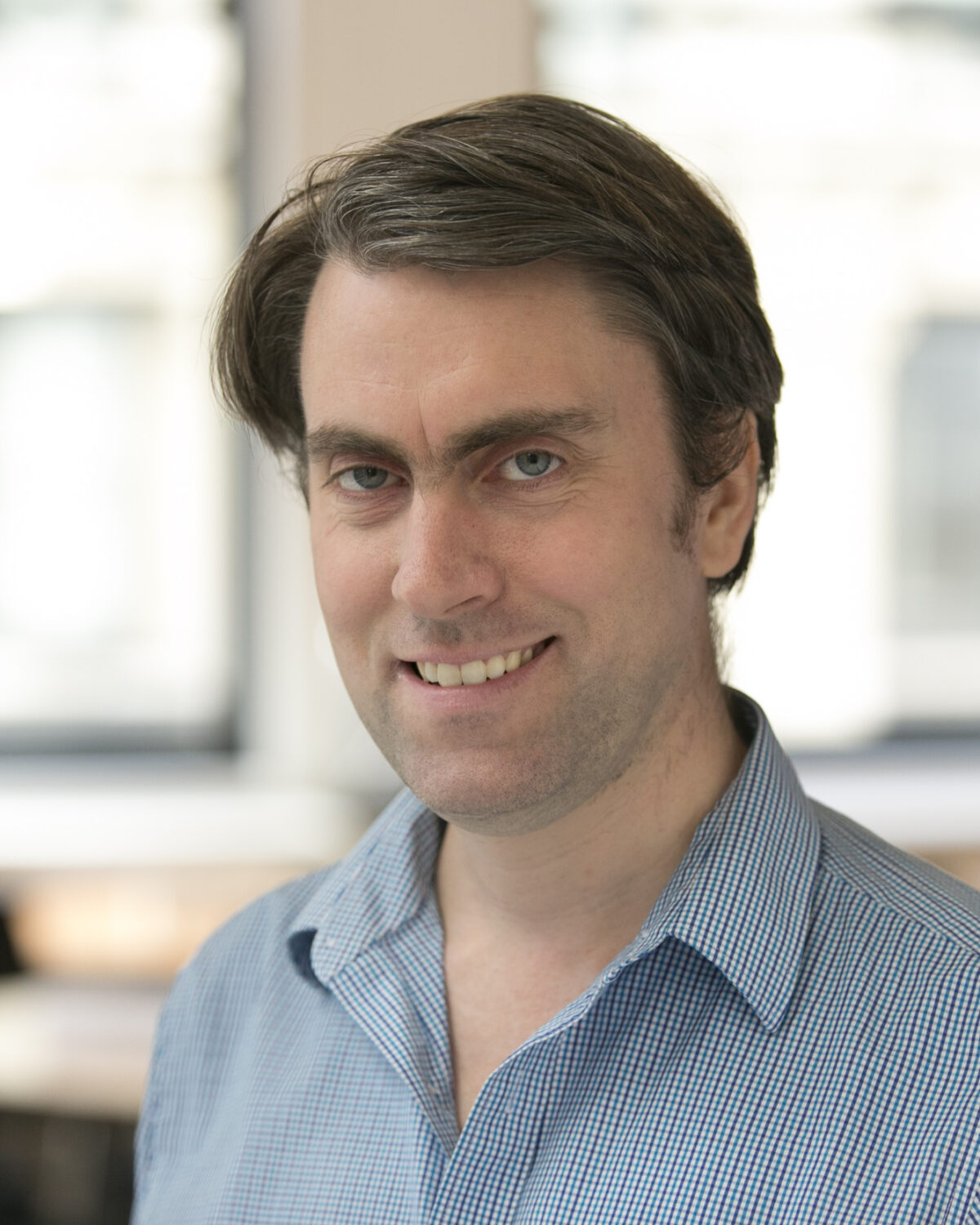 Portrait photo of Allan Sly