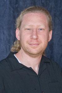 Portrait photo of Daniel Needleman