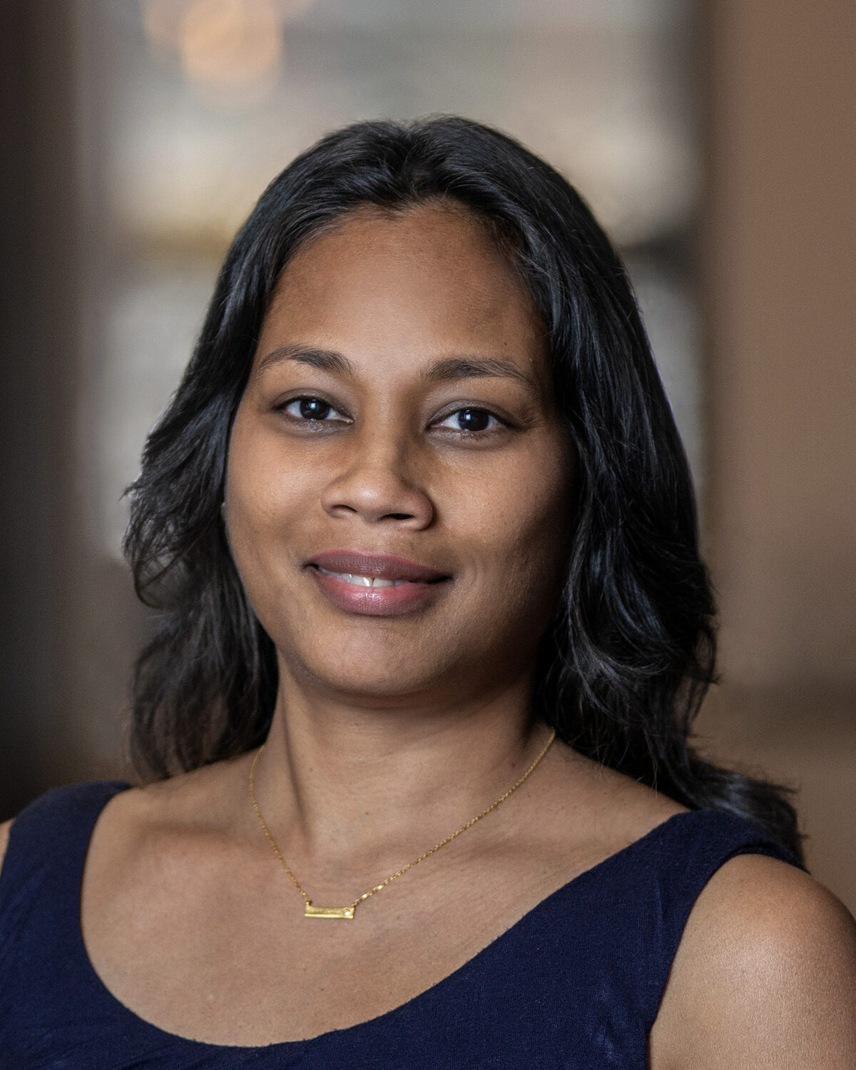 A portrait photo of Cindy Rampersad-Phillips.