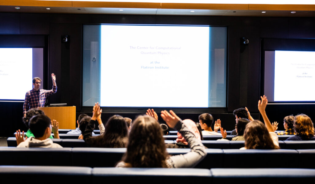 Center for Computational Quantum Physics research scientist Miles Stoudenmire leads an activity about magnets during the STEM Matters NYC Career Day