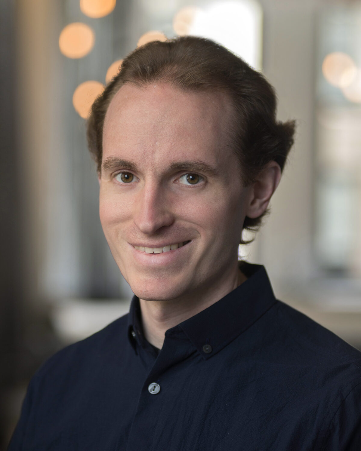 Portrait photo of Dylan Simon