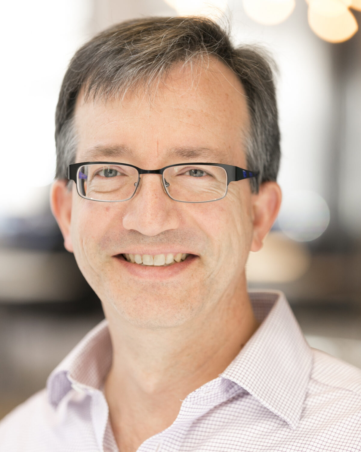 Portrait photo of Christopher Skinner