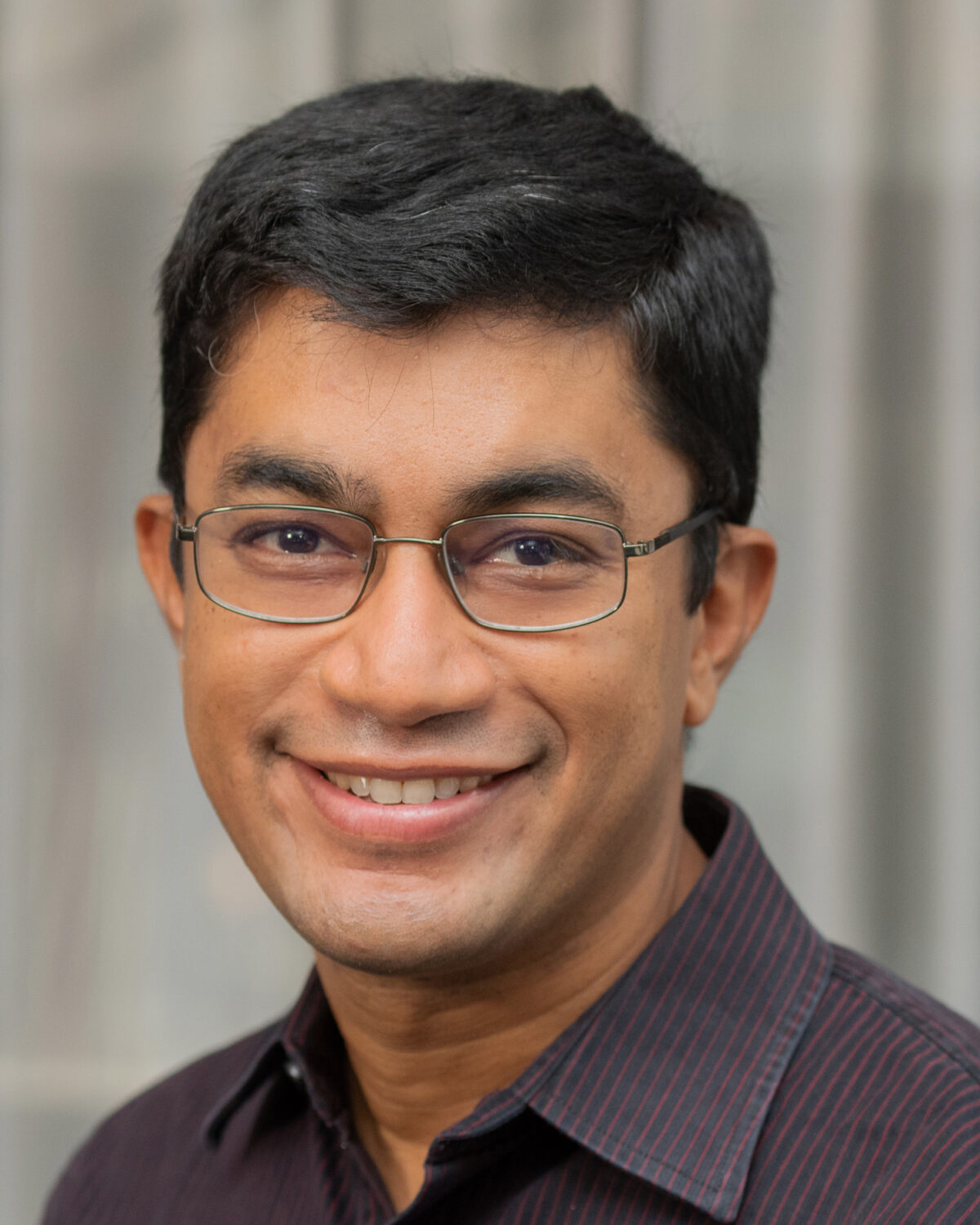 A portrait photo of Venkat Guruswami.