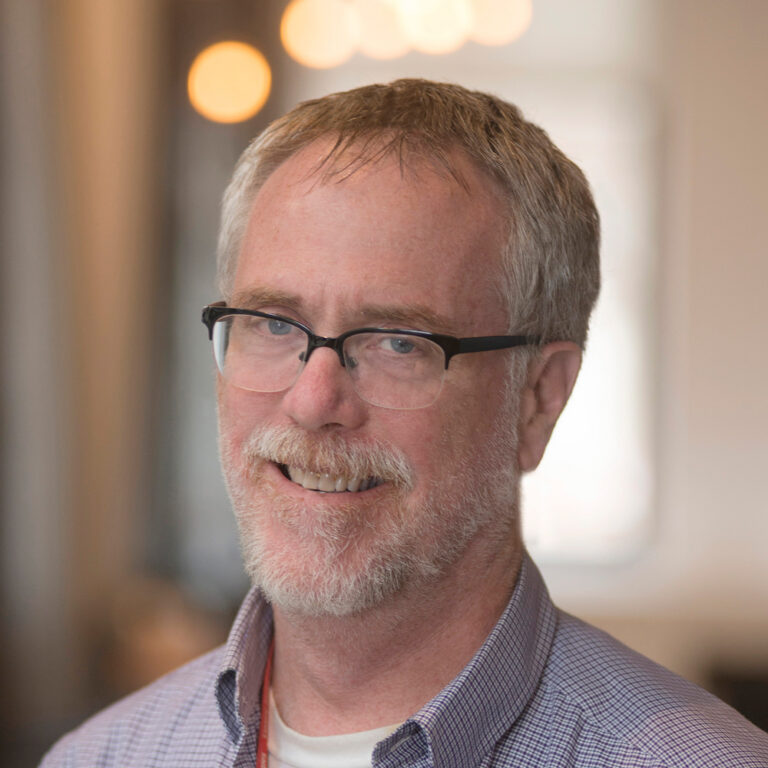 Portrait photo of Aaron Watters