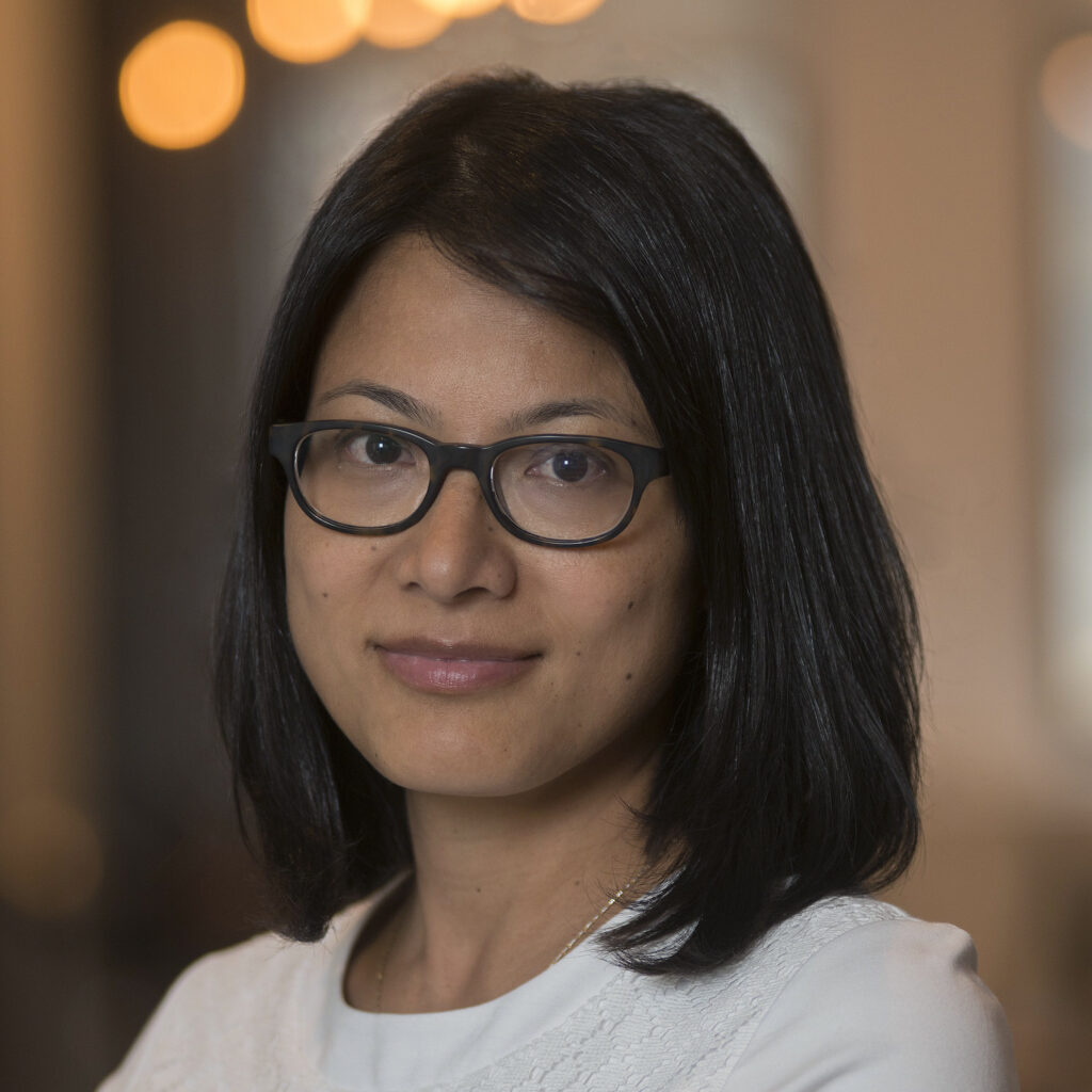 Portrait photo of Alpha Amatya