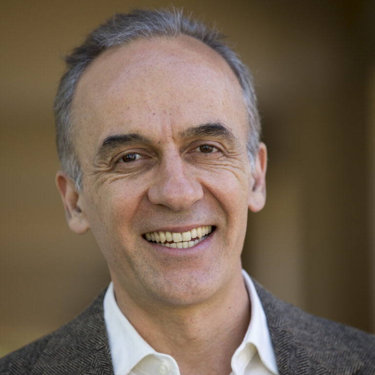 Portrait photo of Eduardo Chichilnisky