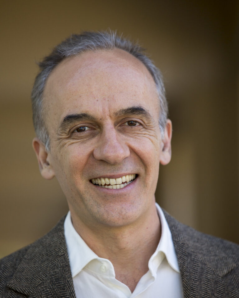 Portrait photo of Eduardo Chichilnisky