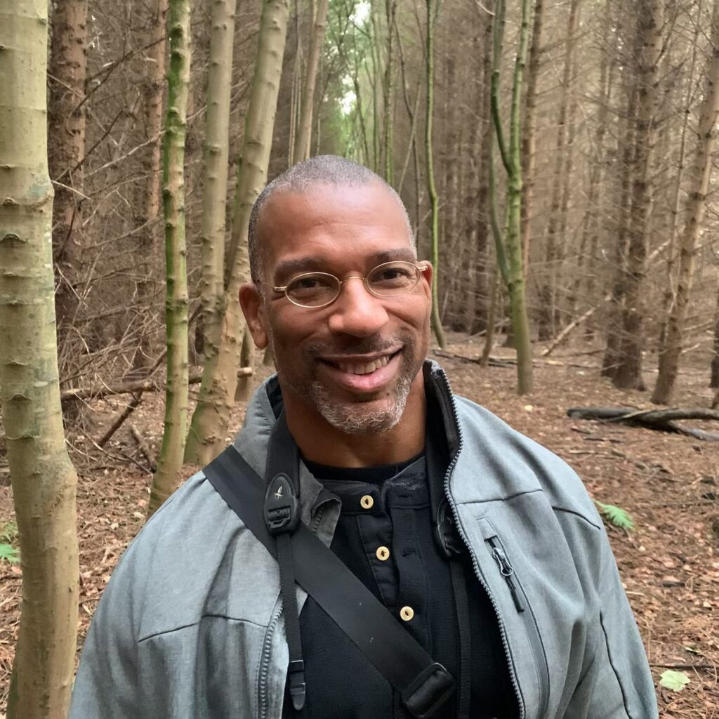 Photo of Christian Cooper in the forest