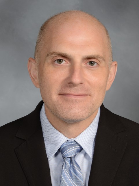 Headshot of David Leyden.