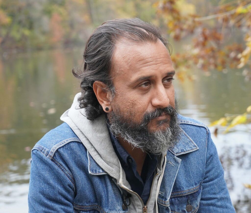 Headshot of Quanta Magazine editor-in-chief Samir Patel.