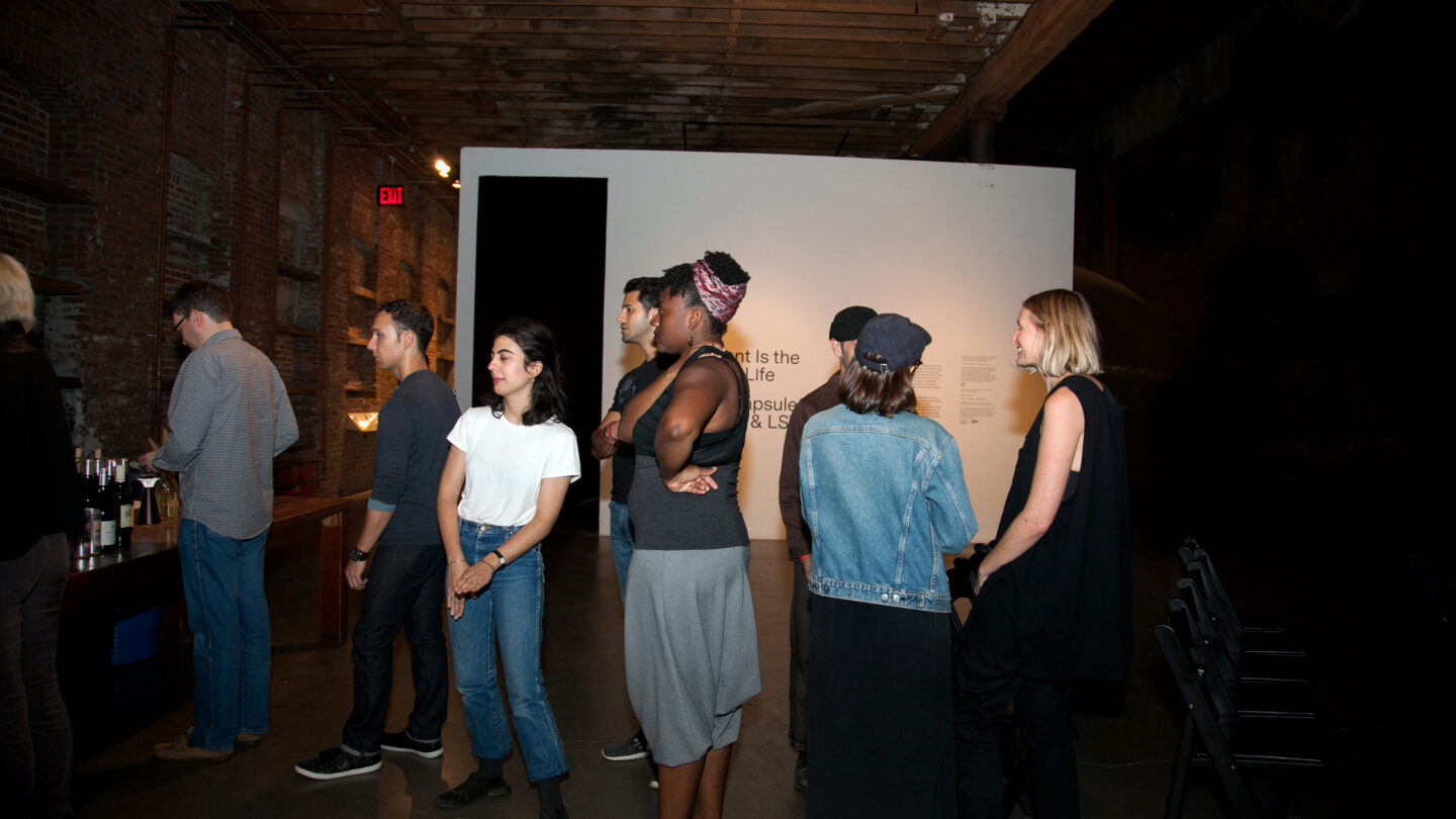 People standing in line for alcohol