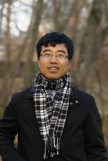 Portrait photo of Xiao-Liang Qi