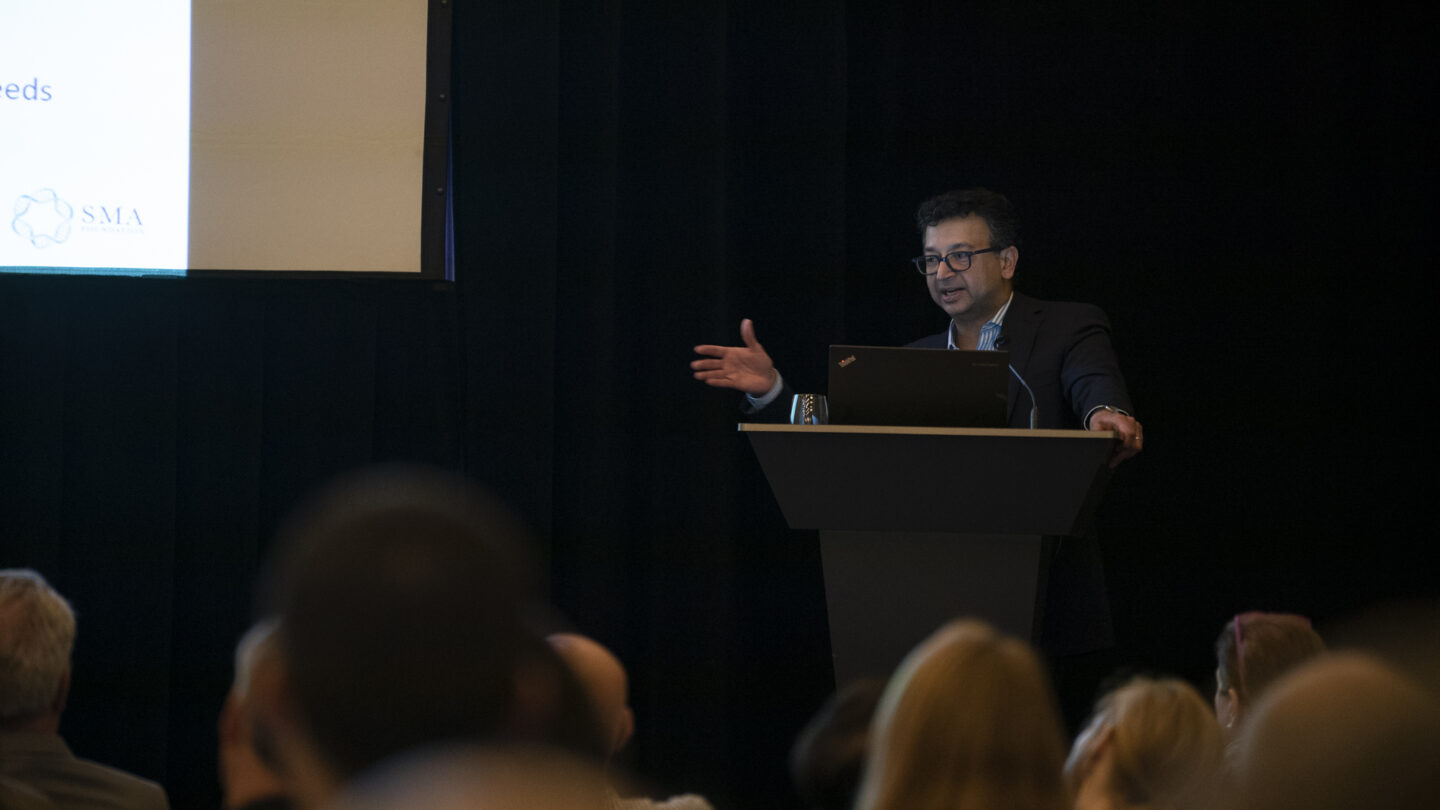 Image of Keynote speaker Dinakar Singh, Chairman of the Spinal Muscular Atrophy (SMA) Foundation, describes the challenges he and his wife, Loren Eng, encountered while establishing the SMA Foundation.