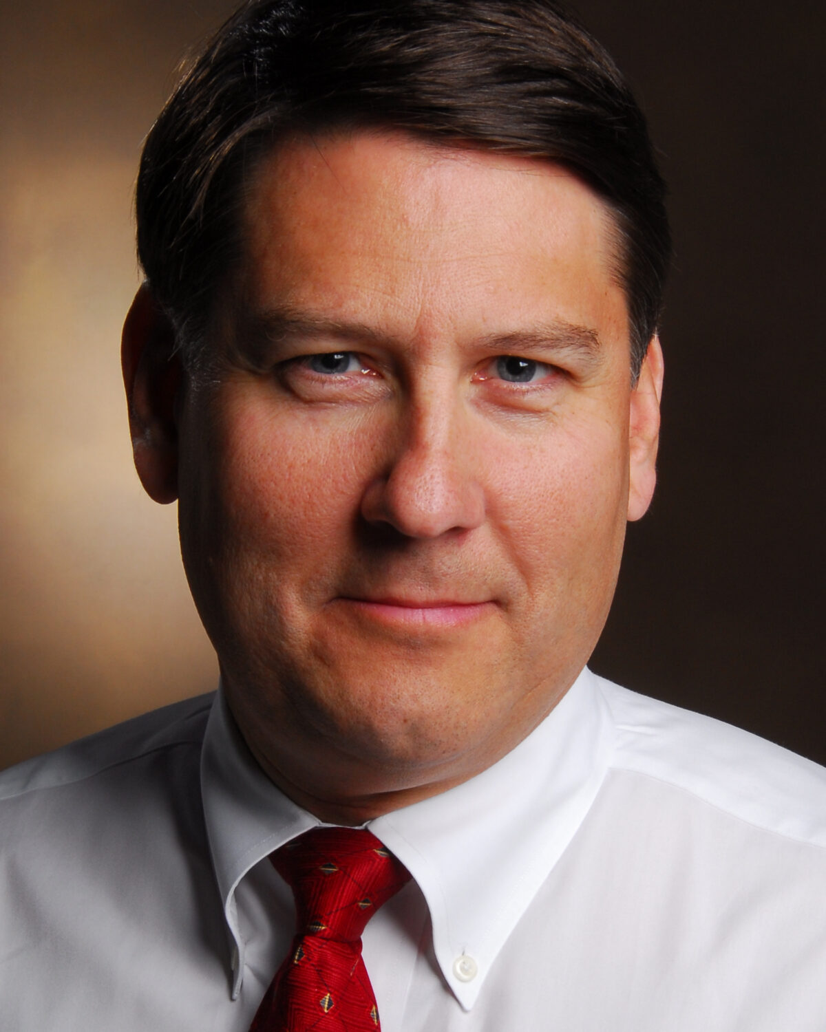 Headshot of SFARI Investigator Alfred George.