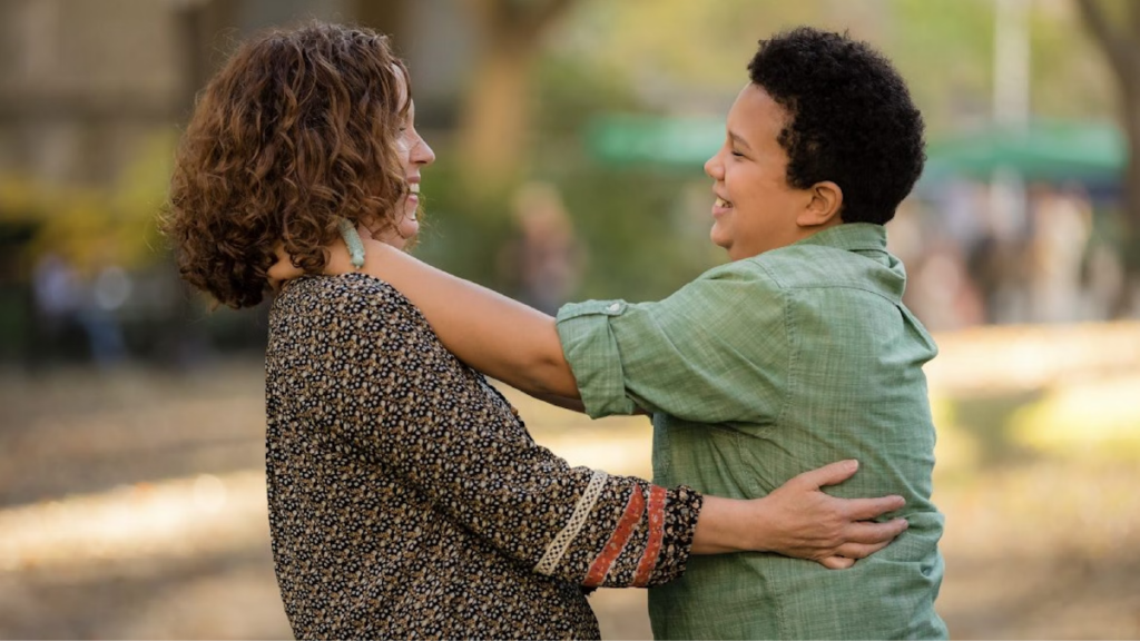 Son and mother embracing