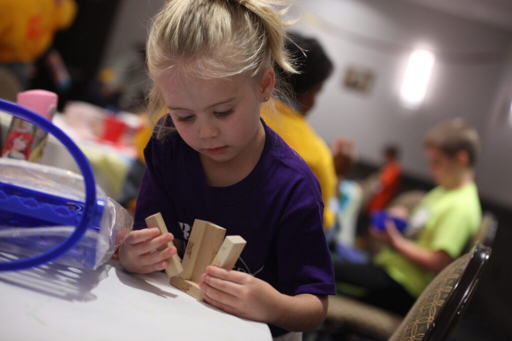 Young girl playing with blocks